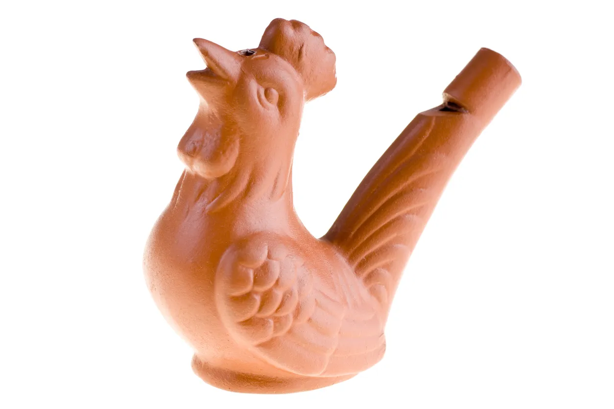 Un fischietto (sifflet) en forme de coq - Photo © iStock-pixelmaniak